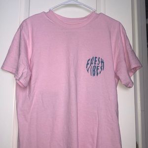 Light pink vsco T-shirt with ocean design on back.
